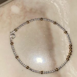 Jewlery: Silver and gold beaded bracelet/anklet